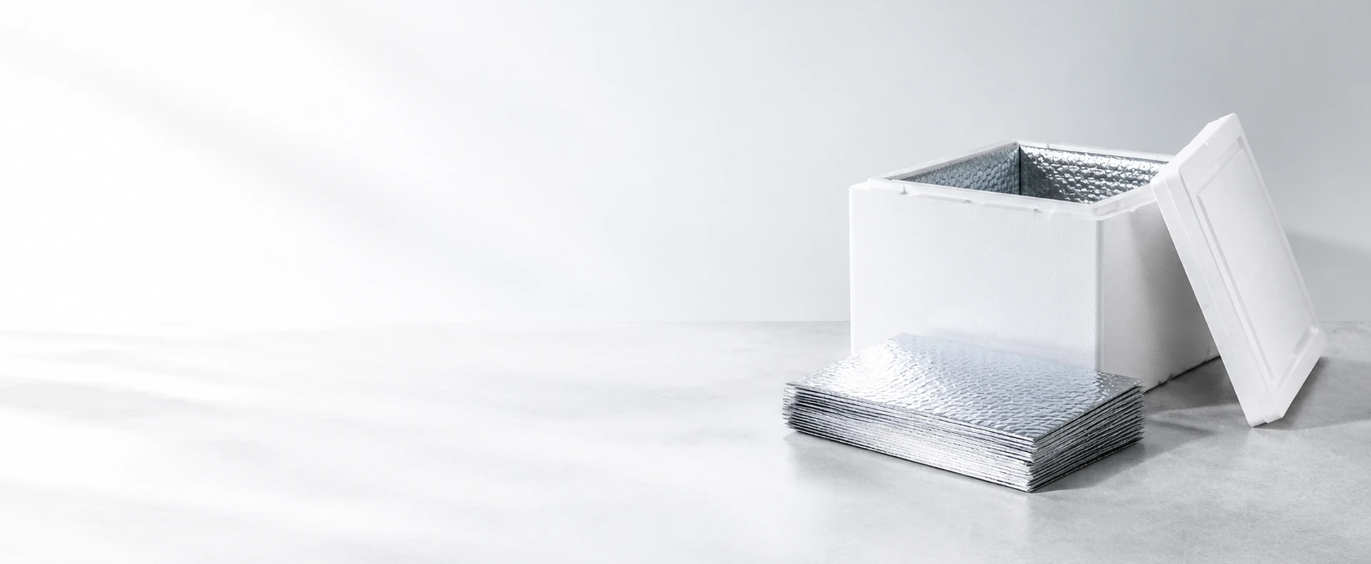 AI-generated thermal packaging scene with light text-safe background